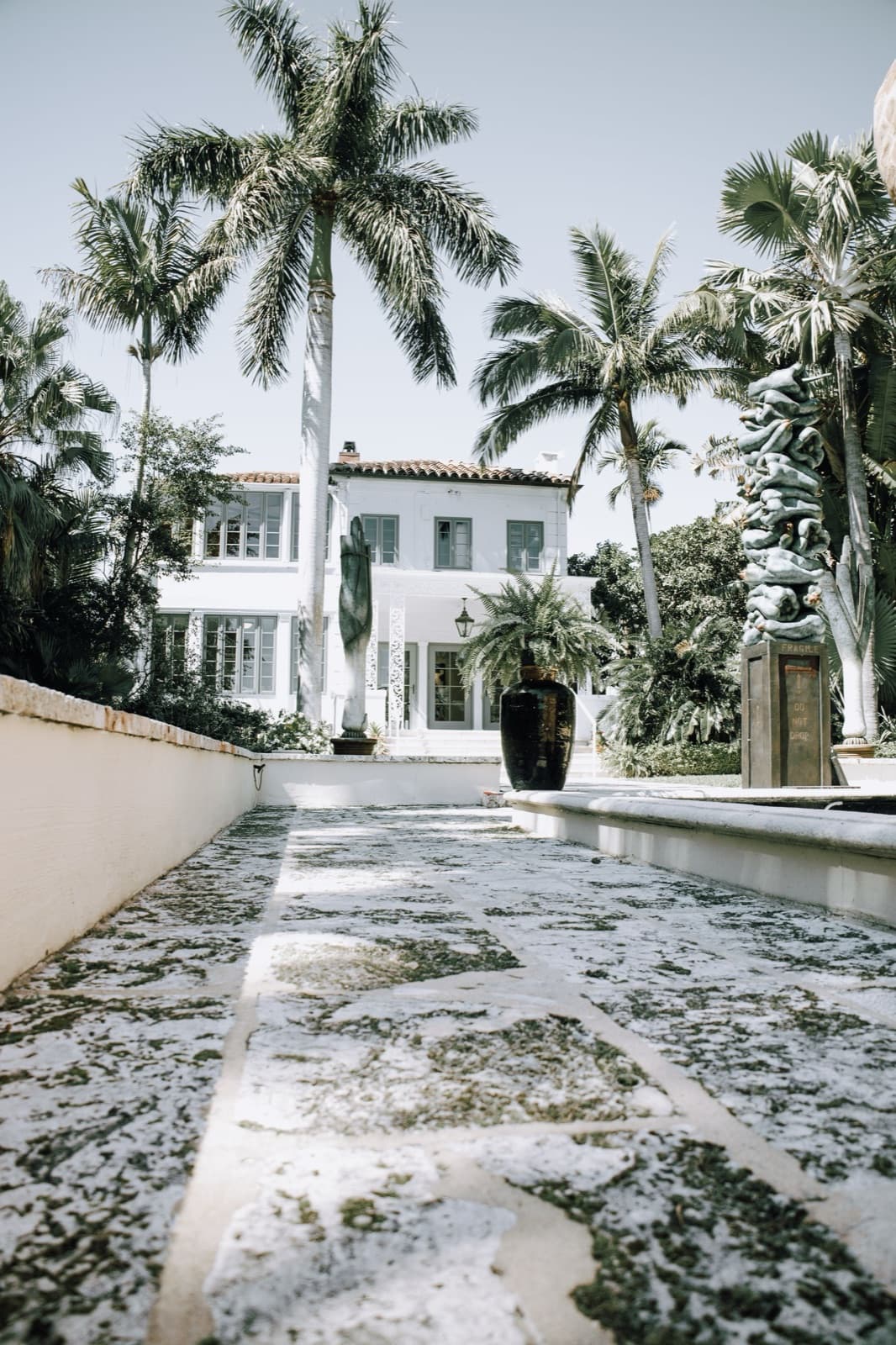 Renovated tropical home with palm trees in West Palm Beach