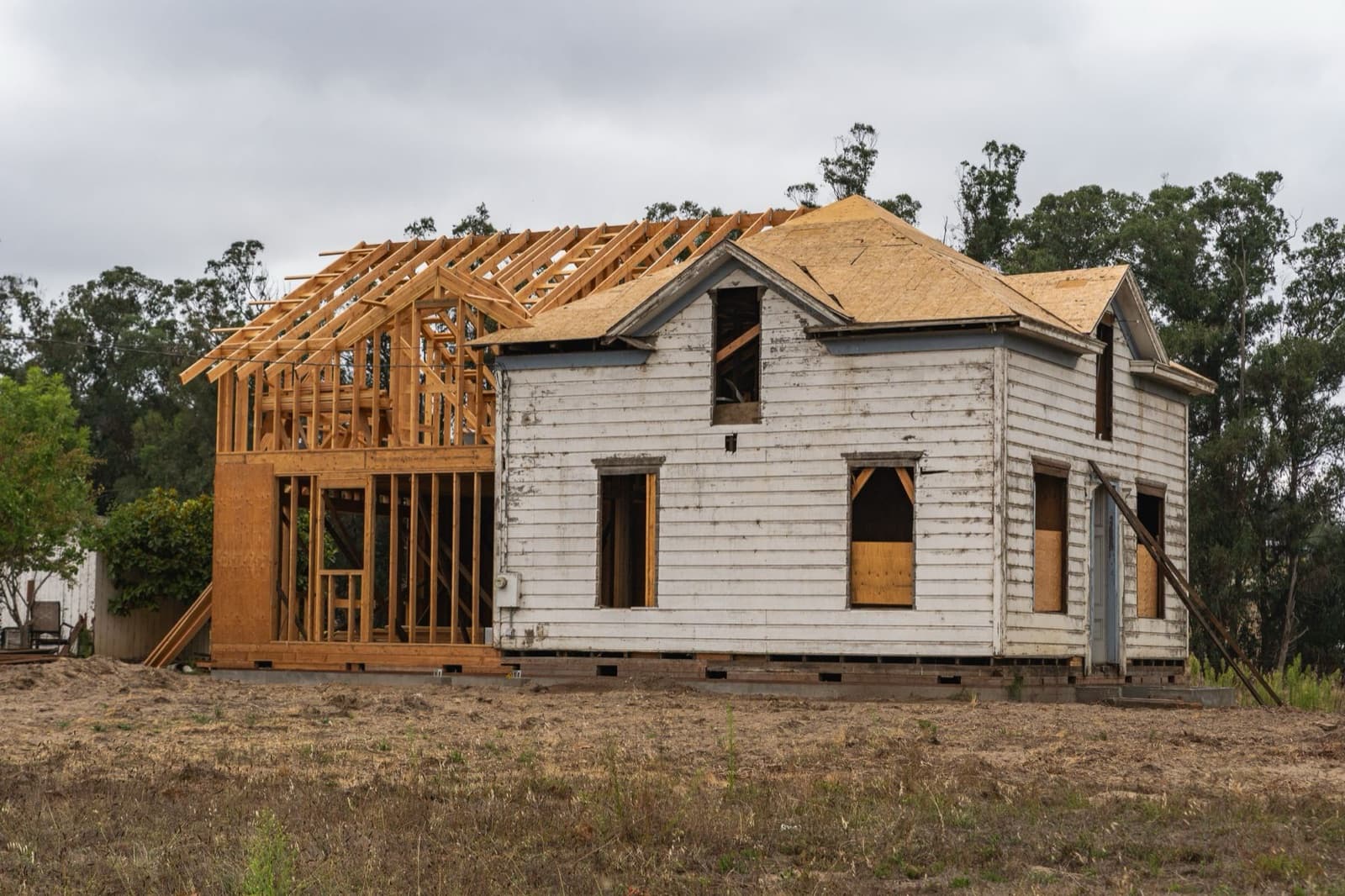 Home addition under construction with new wood framing