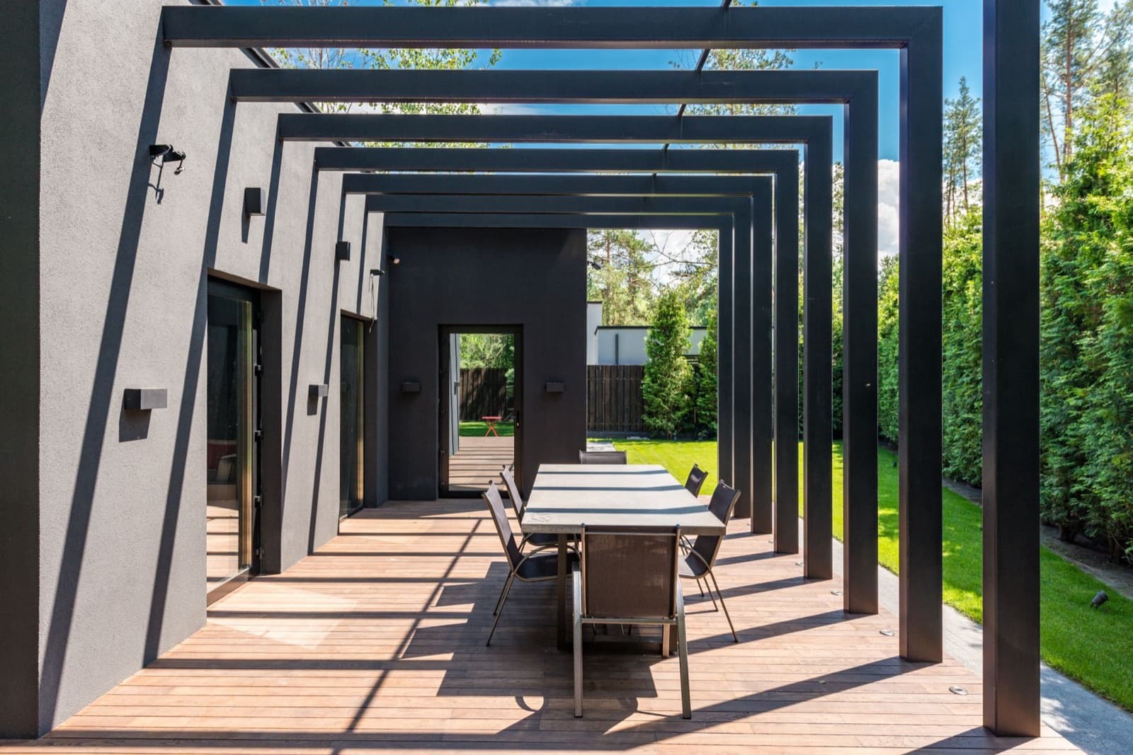 Patio with a pergola and outdoor dining