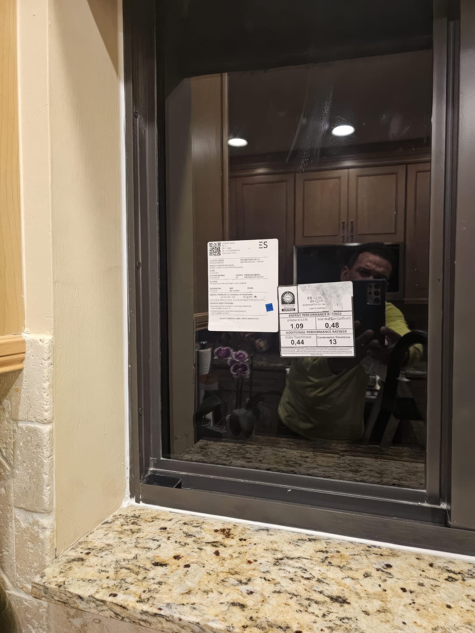 New kitchen window from inside with the product approval label still on
