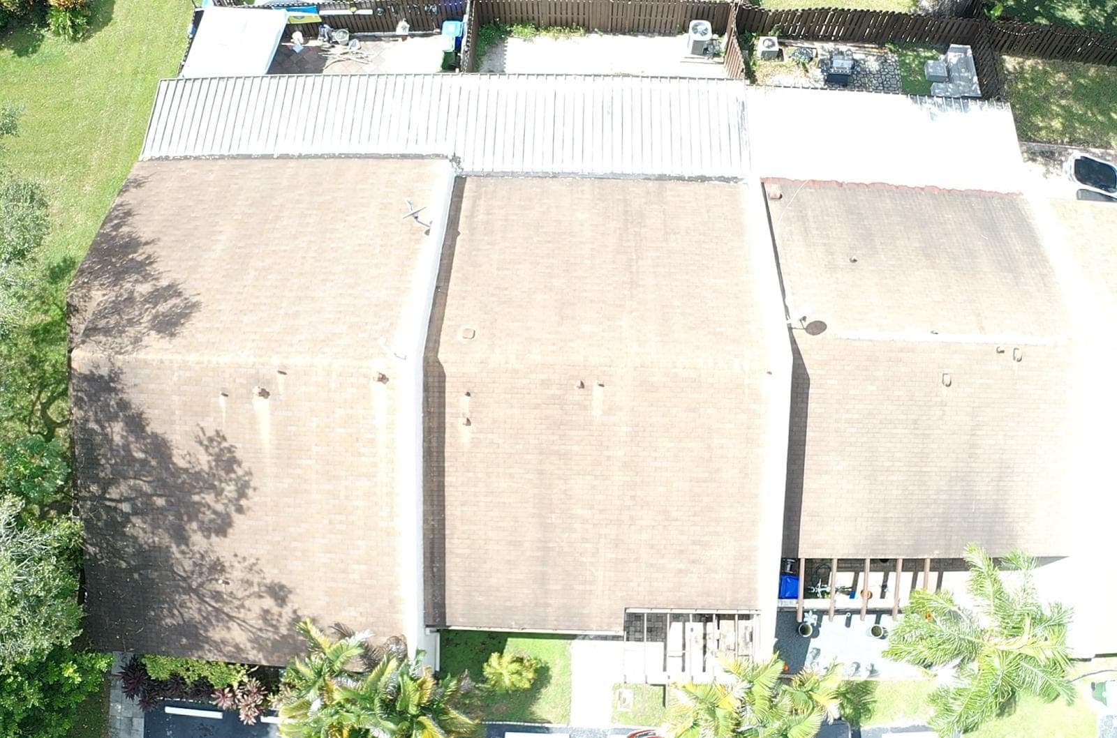Drone view of connected townhouse roofs