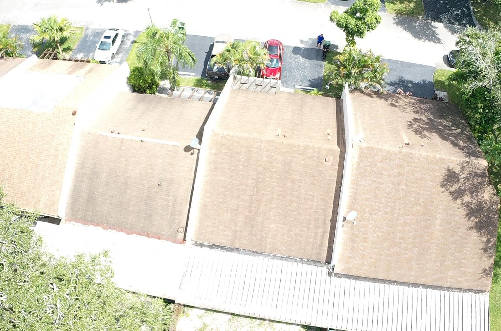 Overhead view of a row of townhouse roofs
