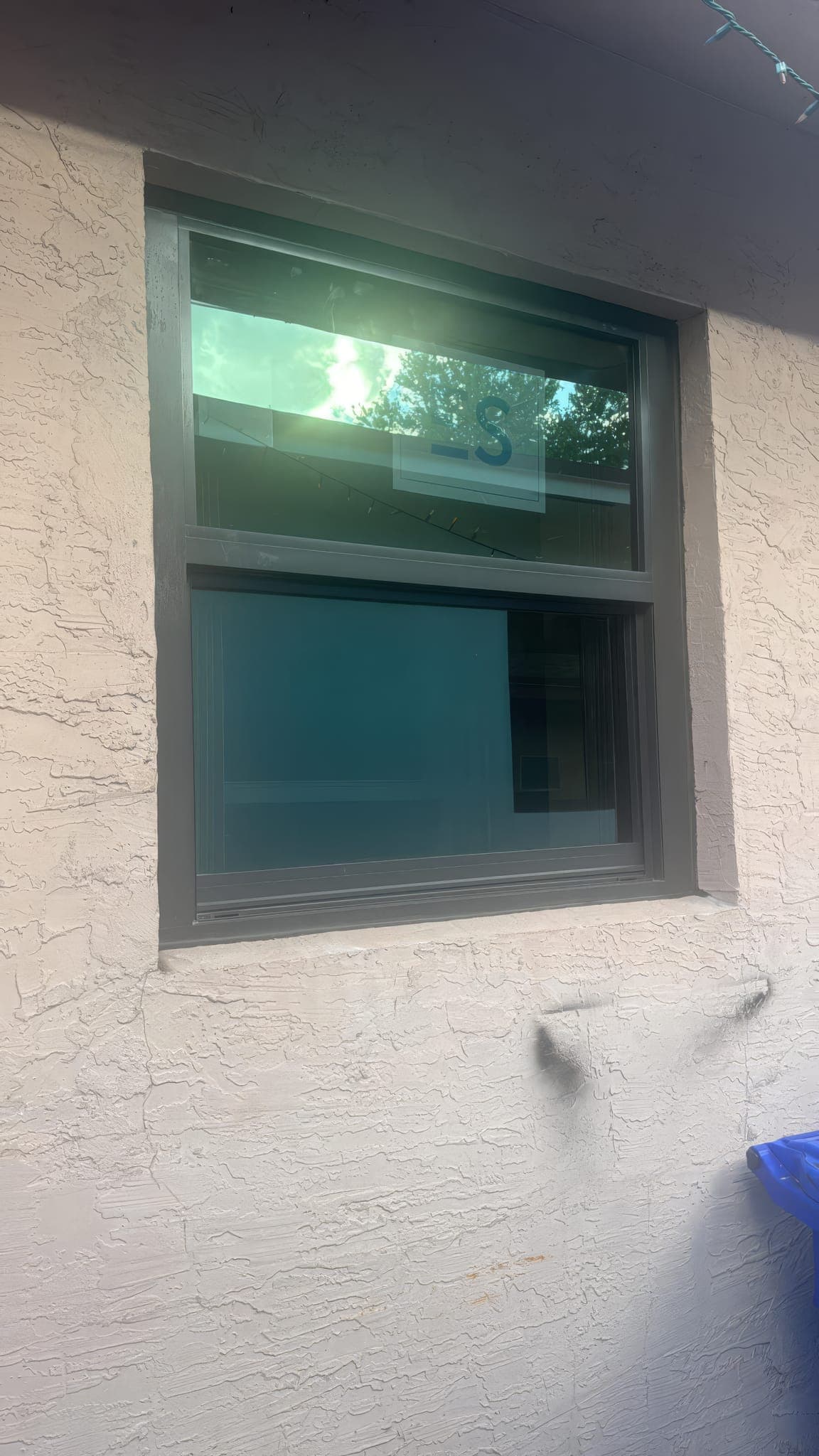 New impact window installed at the side of the house
