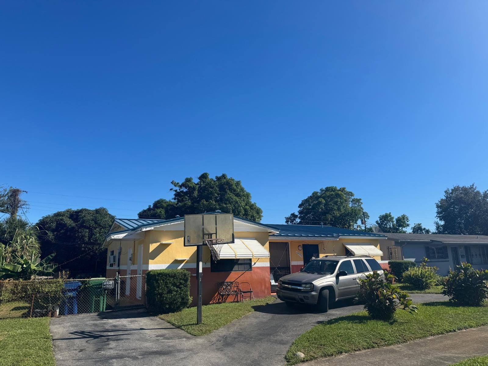 Street view of a home with a new metal roof