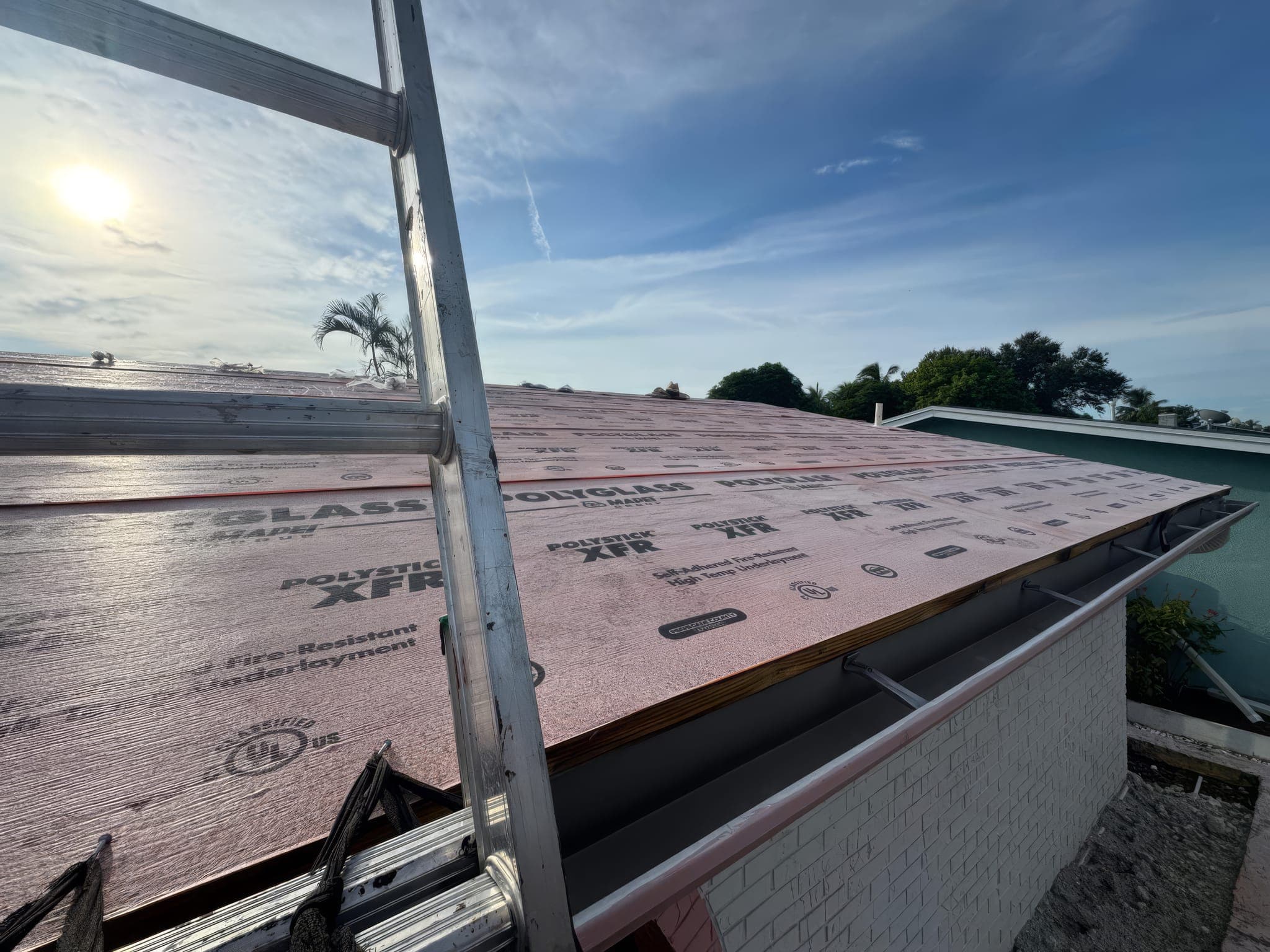 Polyglass self-adhered underlayment installed over the roof deck before the metal panels