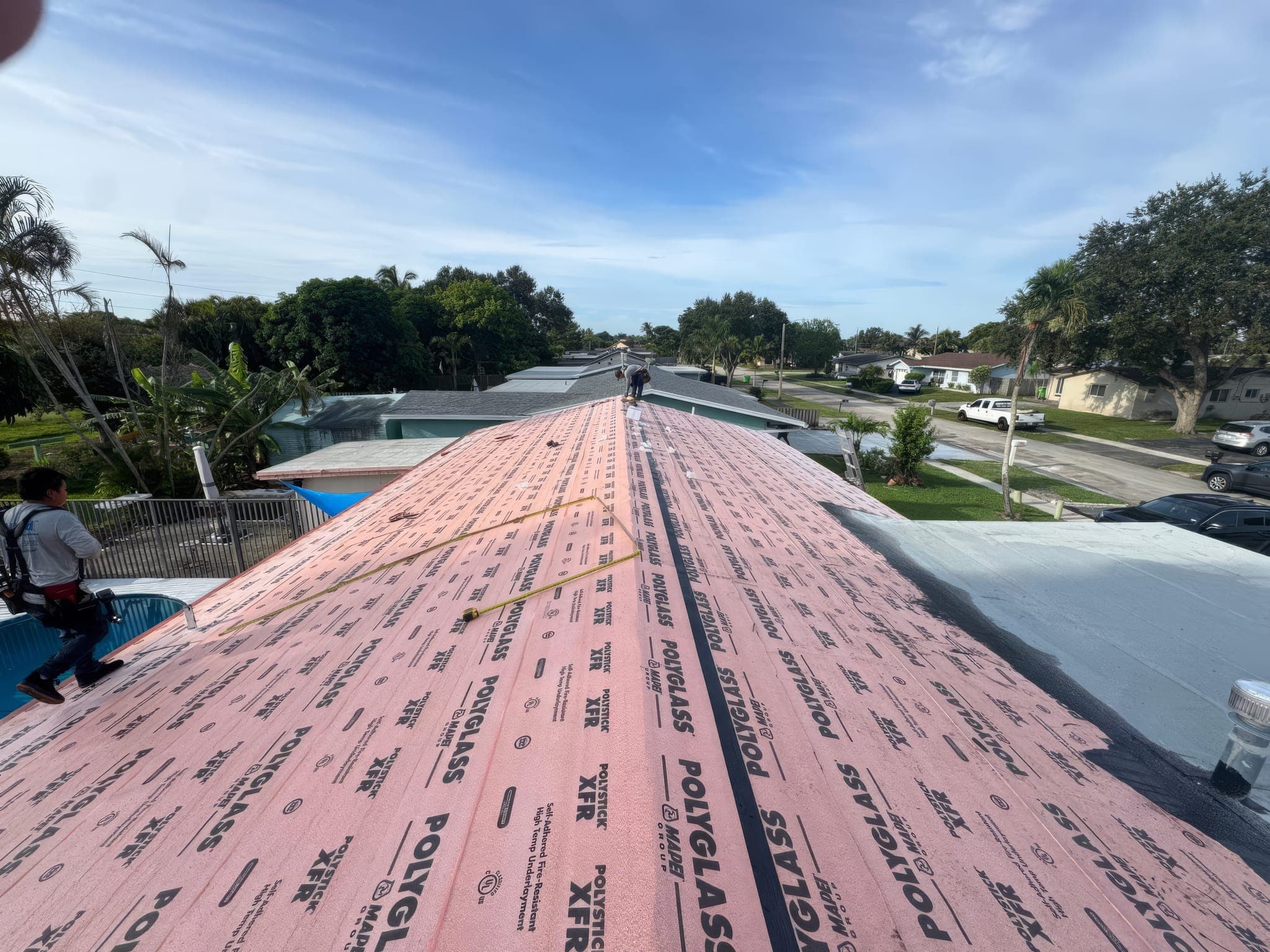 Underlayment stage, looking down the roof toward the street