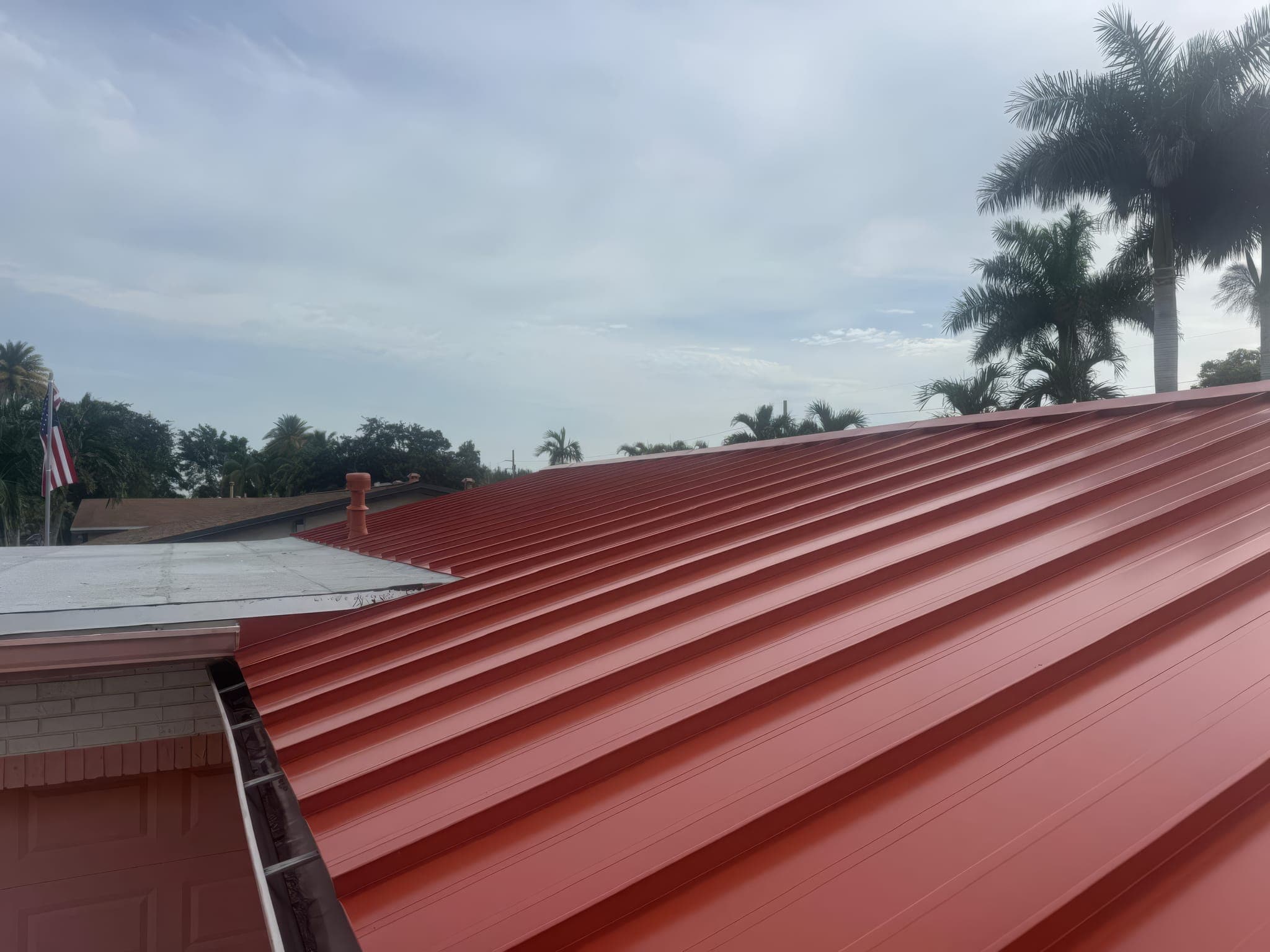 Finished metal roof with matching trim at the gable